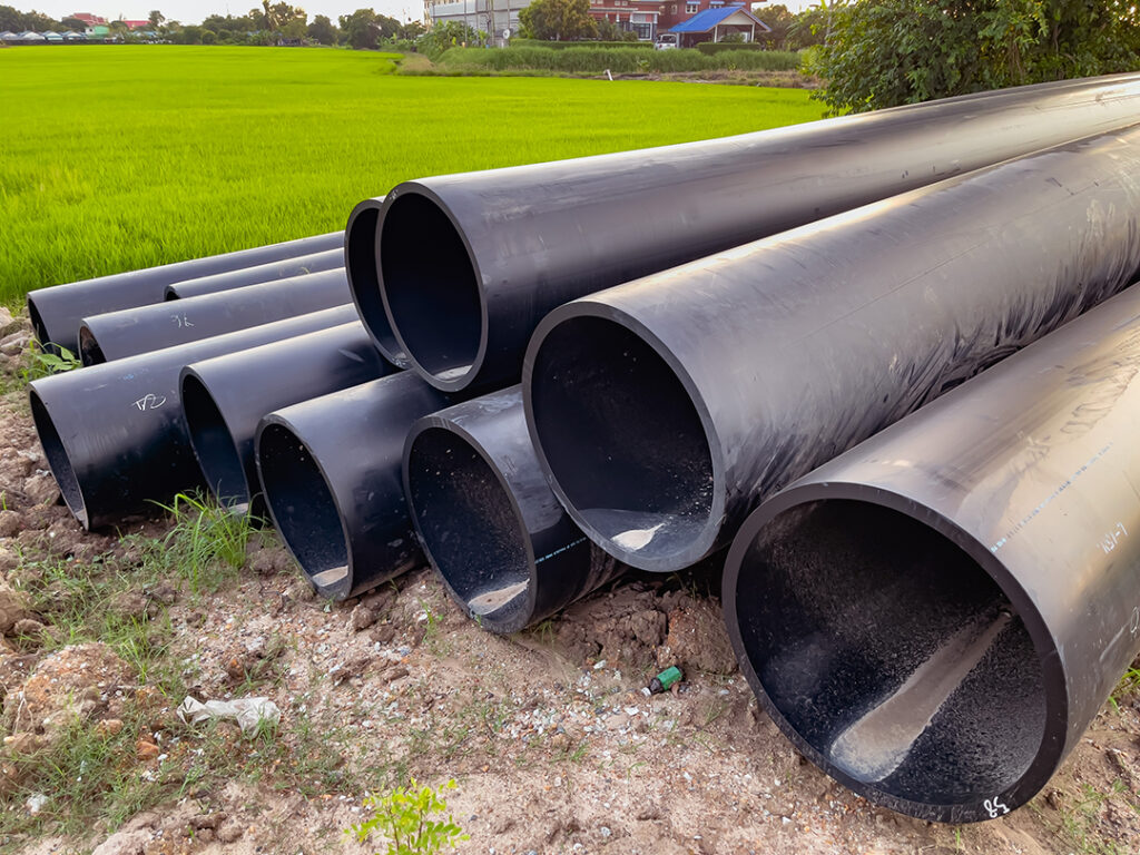 a large water pipeline is ready to be buried Coastal Resources Group