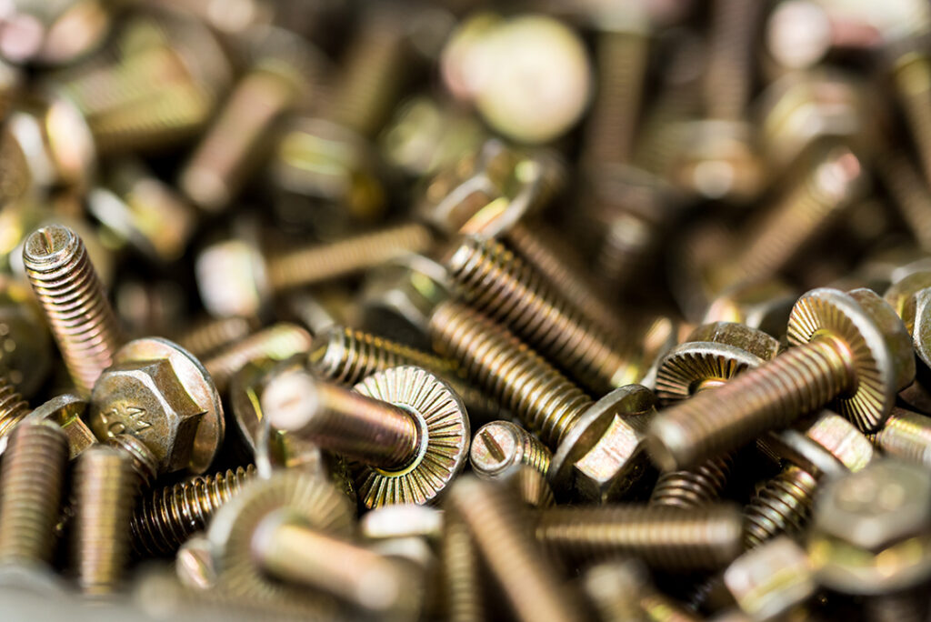 close up bronze bolts background Coastal Resources Group