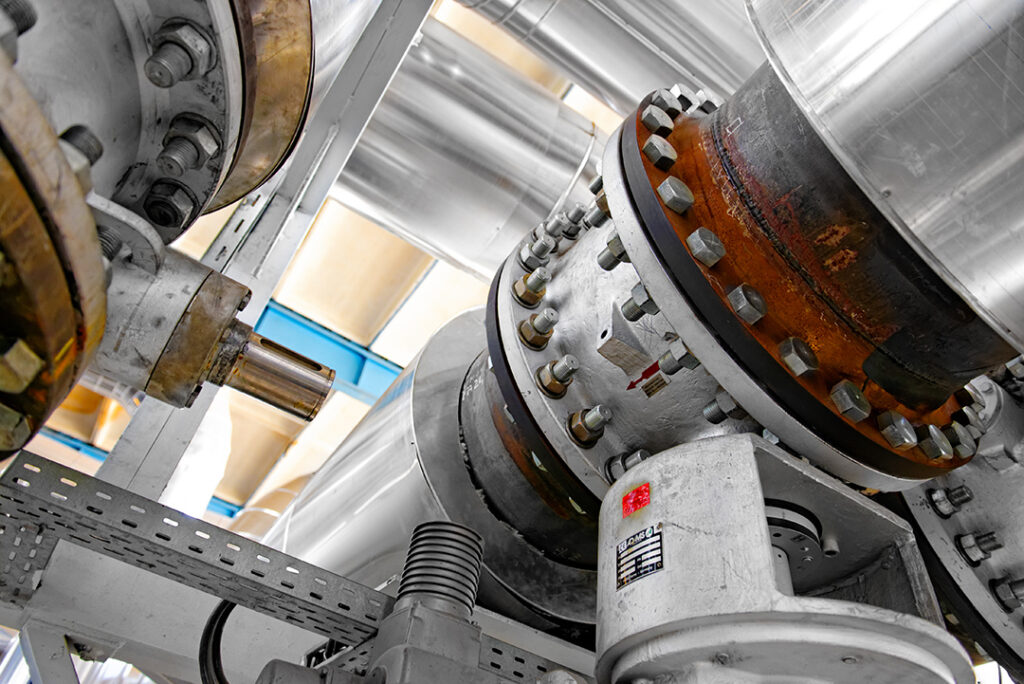 large industrial pipes in a thermal power plant Coastal Resources Group