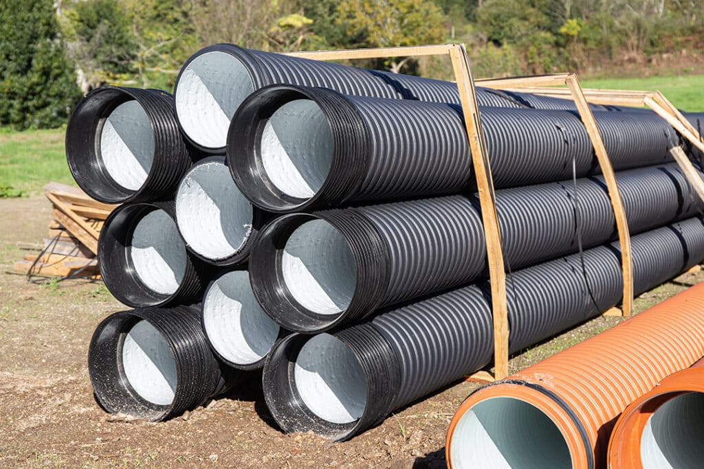 pile of polyethylene drainage pipes 1 Coastal Resources Group