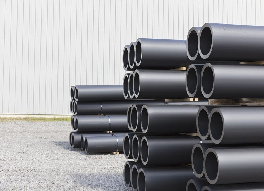 titusvilleunited statesstacks of industrial pvc pipes piled up outside a manufacturing facility 3 mfrh original Coastal Resources Group
